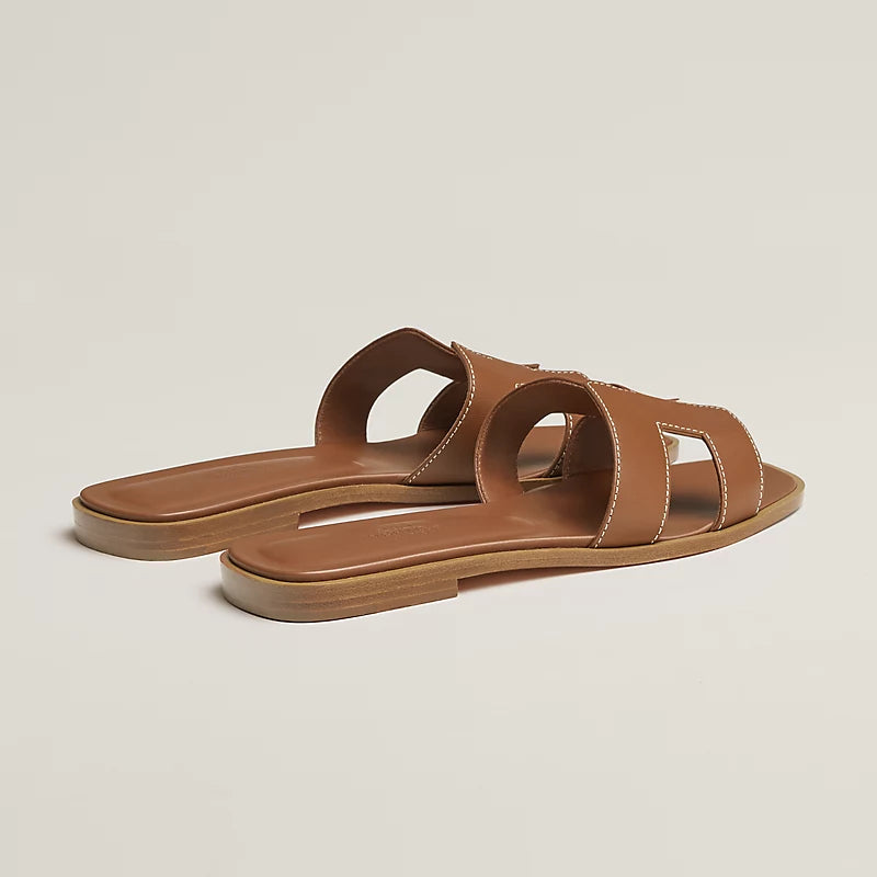 Hermès Oran Sandals Gold