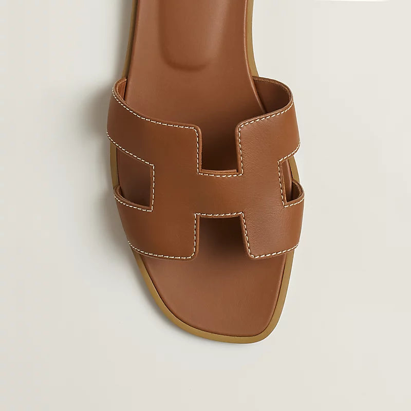 Hermès Oran Sandals Gold